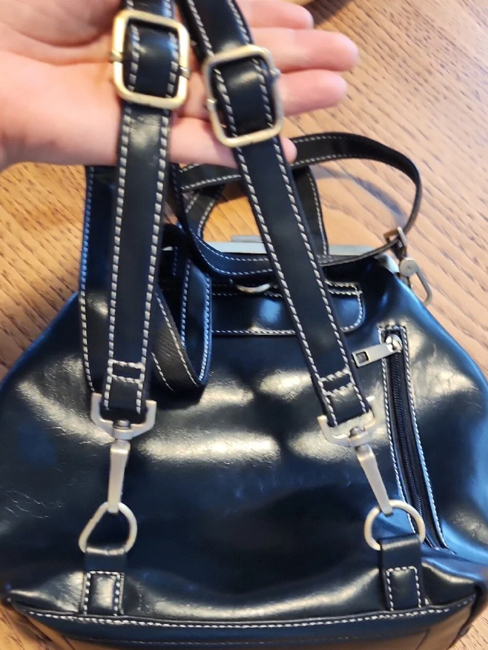 Structured Black Leather Backpack with Gold-Tone Frame